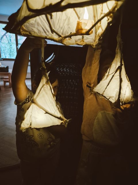 Paper lanterns, finished and glowing